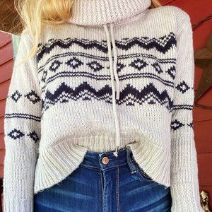 Cropped Turtleneck Sweater.